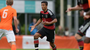 RAALTE, NETHERLANDS - SEPTEMBER 07: Benjamin Henrichs of Germany runs with the ball during the U19 international friendly match between Netherlands and Germany on September 7, 2015 in Raalte, Netherlands. (Photo by Sascha Steinbach/Bongarts/Getty Images)