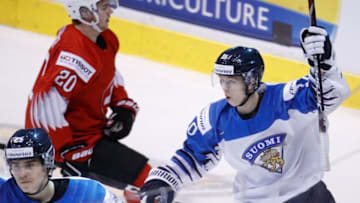 VANCOUVER , BC - JANUARY 4: Aleksi Heponiemi #10 of Finland celebrates a first period goal with teammate Aarne Talvitie #25 against Switzerland during a semi-final game at the IIHF World Junior Championships at Rogers Arena on January 4, 2019 in Vancouver, British Columbia, Canada. (Photo by Kevin Light/Getty Images)