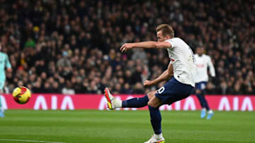 Tottenham Hotspur's English striker Harry Kane shoots and scores a goal during the FA Cup third round football match between Tottenham Hotspur and Brighton and Hove Albion at the Tottenham Hotspur Stadium in London, on February 5, 2022. - - RESTRICTED TO EDITORIAL USE. No use with unauthorized audio, video, data, fixture lists, club/league logos or 'live' services. Online in-match use limited to 120 images. An additional 40 images may be used in extra time. No video emulation. Social media in-match use limited to 120 images. An additional 40 images may be used in extra time. No use in betting publications, games or single club/league/player publications. (Photo by Daniel LEAL / AFP) / RESTRICTED TO EDITORIAL USE. No use with unauthorized audio, video, data, fixture lists, club/league logos or 'live' services. Online in-match use limited to 120 images. An additional 40 images may be used in extra time. No video emulation. Social media in-match use limited to 120 images. An additional 40 images may be used in extra time. No use in betting publications, games or single club/league/player publications. / RESTRICTED TO EDITORIAL USE. No use with unauthorized audio, video, data, fixture lists, club/league logos or 'live' services. Online in-match use limited to 120 images. An additional 40 images may be used in extra time. No video emulation. Social media in-match use limited to 120 images. An additional 40 images may be used in extra time. No use in betting publications, games or single club/league/player publications. (Photo by DANIEL LEAL/AFP via Getty Images)