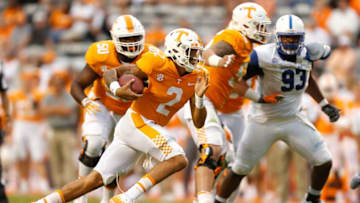 KNOXVILLE, TN - SEPTEMBER 09: Jarrett Guarantano #2 of the Tennessee Volunteers runs for a first down during the second half of the game against the Indiana State Sycamores at Neyland Stadium on September 9, 2017 in Knoxville, Tennessee. (Photo by Michael Reaves/Getty Images)