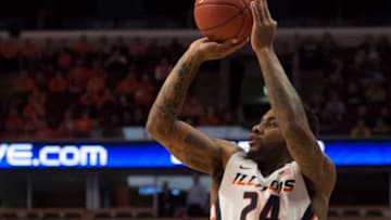 March 12, 2015: Illinois' Rayvonte Rice (24) attempts a three during the Big Ten Men's Basketball Tournament game between the Illinois Fighting Illini and the Michigan Wolverines at the United Center in Chicago, IL. (Photo by Paul Bergstrom/Icon Sportswire/Corbis via Getty Images)