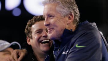 EAST RUTHERFORD, NJ - FEBRUARY 02: (L-R) John Schneider, General Manager of the Seattle Seahawks and head coach Pete Carroll celebrates after their 43-8 victory over the Denver Broncos during Super Bowl XLVIII at MetLife Stadium on February 2, 2014 in East Rutherford, New Jersey. (Photo by Kevin C. Cox/Getty Images)