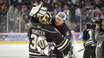 HERSHEY, PA - FEBRUARY 09: Hershey Bears goalie Ilya Samsonov (35) hugs and congratulates fellow goalie Vitek Vanecek (30) after stopping all five shooters during the shoot out after the Charlotte Checkers vs. Hershey Bears AHL game February 9, 2019 at the Giant Center in Hershey, PA. (Photo by Randy Litzinger/Icon Sportswire via Getty Images)