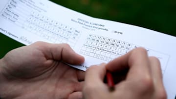 BROUGHTON, ENGLAND - OCTOBER 5: A Competitor signs his scorecard during the final round of the Skins PGA Fourball Championship at Forest Pines Hotel & Golf Club on October 5, 2012 in Broughton, England. (Photo by Jan Kruger/Getty Images)