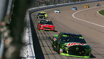 KANSAS CITY, KS - OCTOBER 21: Chase Elliott, driver of the #9 Mountain Dew Chevrolet, leads a pack of cars during the Monster Energy NASCAR Cup Series Hollywood Casino 400 at Kansas Speedway on October 21, 2018 in Kansas City, Kansas. (Photo by Matt Sullivan/Getty Images)