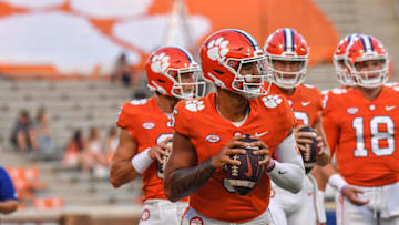 Sep 17, 2022; Clemson, South Carolina, USA; Clemson Tigers quarterback D.J. Uiagalelei (5) warms up with quarterbacks before a game against the Louisiana Tech Bulldogs at Memorial Stadium. Mandatory Credit: Ken Ruinard-USA TODAY Sports