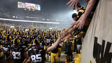 IOWA CITY, IOWA- AUGUST 31: Members of the Iowa Hawkeyes leave the field after the match-up against the Miami Ohio RedHawks on August 31, 2019 at Kinnick Stadium in Iowa City, Iowa. (Photo by Matthew Holst/Getty Images)