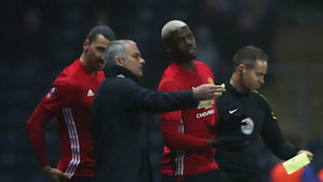 BLACKBURN, ENGLAND - FEBRUARY 19: Paul Pogba and Zlatan Ibrahimovic of Manchester United prepare to enter the field as substitutes as manager Jose Mourinho gives instructions during the Emirates FA Cup Fifth Round match between Blackburn Rovers and Manchester United at Ewood Park on February 19, 2017 in Blackburn, England. (Photo by Chris Brunskill Ltd/Getty Images)