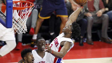 Apr 24, 2016; Auburn Hills, MI, USA; Detroit Pistons forward Stanley Johnson (3) gets a rebound over Cleveland Cavaliers guard Iman Shumpert (4) during the fourth quarter in game four of the first round of the NBA Playoffs at The Palace of Auburn Hills. Cavs win 100-98. Mandatory Credit: Raj Mehta-USA TODAY Sports