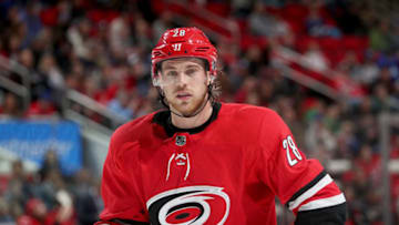 RALEIGH, NC - APRIL 7: Elias Lindholm #28 of the Carolina Hurricanes prepares for a faceoff during an NHL game against the Tampa Bay Lightning on April 7, 2018 at PNC Arena in Raleigh, North Carolina. (Photo by Gregg Forwerck/NHLI via Getty Images)