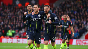 SOUTHAMPTON, ENGLAND - DECEMBER 30: David Silva of Manchester City (21) celebrates after scoring his team's first goal with team mates Bernardo Silva and Riyad Mahrez during the Premier League match between Southampton FC and Manchester City at St Mary's Stadium on December 30, 2018 in Southampton, United Kingdom. (Photo by Catherine Ivill/Getty Images)