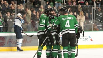 DALLAS, TX - JANUARY 19: Jamie Benn #14, Alexander Radulov #47, Miro Heiskanen #4 and the Dallas Stars celebrate a goal against the Winnipeg Jets at the American Airlines Center on January 19, 2019 in Dallas, Texas. (Photo by Glenn James/NHLI via Getty Images)