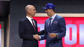 NEW YORK, NY - JUNE 22: Luke Kennard walks on stage with NBA commissioner Adam Silver after being drafted 12th overall by the Detroit Pistons during the first round of the 2017 NBA Draft at Barclays Center on June 22, 2017 in New York City. NOTE TO USER: User expressly acknowledges and agrees that, by downloading and or using this photograph, User is consenting to the terms and conditions of the Getty Images License Agreement. (Photo by Mike Stobe/Getty Images)