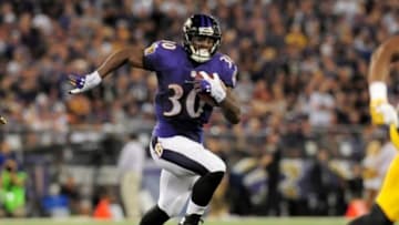 Sep 11, 2014; Baltimore, MD, USA; Baltimore Ravens running back Bernard Pierce (30) runs with the ball against the Pittsburgh Steelers at M&T Bank Stadium. Mandatory Credit: Evan Habeeb-USA TODAY Sports