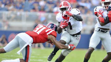 Sep 24, 2016; Oxford, MS, USA; Georgia Bulldogs running back Sony Michel (1) attempts to avoid Mississippi Rebels defensive back Jaylon Jones (31) during the third quarter of the game at Vaught-Hemingway Stadium. Mississippi won 45-14. Mandatory Credit: Matt Bush-USA TODAY Sports