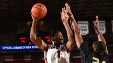 Dec 1, 2015; Athens, GA, USA; Georgia Bulldogs forward Yante Maten (1) shoots over Oakland Golden Grizzlies center Percy Gibson (24) during the second half at Stegeman Coliseum. Georgia defeated Oakland 86-82. Mandatory Credit: Dale Zanine-USA TODAY Sports