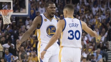 October 25, 2016; Oakland, CA, USA; Golden State Warriors forward Kevin Durant (35) celebrates with guard Stephen Curry (30) against the San Antonio Spurs during the second quarter at Oracle Arena. Mandatory Credit: Kyle Terada-USA TODAY Sports
