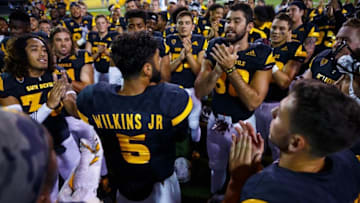 Sep 10, 2016; Tempe, AZ, USA; Arizona State Sun Devils quarterback Manny Wilkins (5) talks to teammates in the huddle against the Texas Tech Red Raiders at Sun Devil Stadium. Mandatory Credit: Mark J. Rebilas-USA TODAY Sports