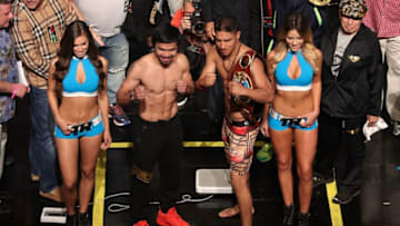 LAS VEGAS, NV - NOVEMBER 04: Manny Pacquiao (L) and WBO welterweight champion Jessie Vargas pose during their official weigh-in at the Encore Theater at Wynn Las Vegas on November 4, 2016 in Las Vegas, Nevada. Vargas will defend his title against Pacquiao on November 5 at the Thomas