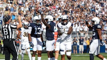 Sep 3, 2016; University Park, PA, USA; Penn State Nittany Lions wide receiver DaeSean Hamilton (5) celebrates after scoring a touchdown during the first quarter against the Kent State Golden Flashes at Beaver Stadium. Mandatory Credit: Matthew O