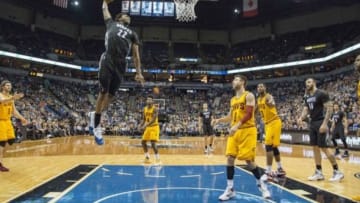 Jan 8, 2016; Minneapolis, MN, USA; Minnesota Timberwolves guard Andrew Wiggins (22) dunks the ball in the first half against the Cleveland Cavaliers at Target Center. The Cavaliers won 125-99. Mandatory Credit: Jesse Johnson-USA TODAY Sports