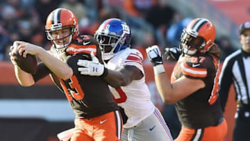 Nov 27, 2016; Cleveland, OH, USA; New York Giants defensive end Jason Pierre-Paul (90) sacks Cleveland Browns quarterback Josh McCown (13) during the first half at FirstEnergy Stadium. Mandatory Credit: Ken Blaze-USA TODAY Sports