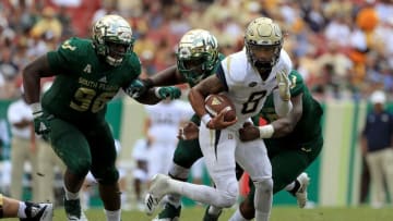TAMPA, FL - SEPTEMBER 08: Tobias Oliver #8 of the Georgia Tech Yellow Jackets rushes during a game against the South Florida Bulls at Raymond James Stadium on September 8, 2018 in Tampa, Florida. (Photo by Mike Ehrmann/Getty Images)