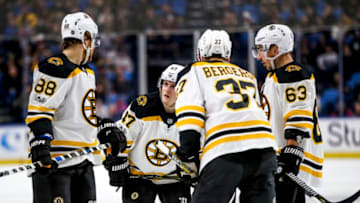 BUFFALO, NY - December 19: Boston Bruins defenseman Torey Krug (47) talks over the next play with teammates Boston Bruins right wing David Pastrnak (88), Boston Bruins center Patrice Bergeron (37) and Boston Bruins left wing Brad Marchand (63) during an NHL game between the Boston Bruins and Buffalo Sabres on December 19, 2017, at KeyBank Center in Buffalo, NY. (Jerome Davis/Icon Sportswire via Getty Images)