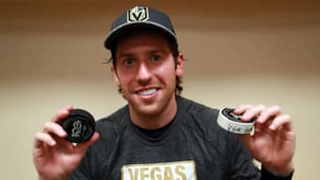 DALLAS, TX - OCTOBER 06: James Neal #18 of the Vegas Golden Knights displays the two pucks used while scoring the first two goals in team history against the Dallas Stars at American Airlines Center on October 6, 2017 in Dallas, Texas. (Photo by Tom Pennington/Getty Images)