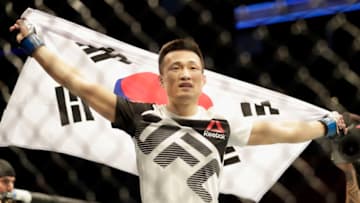 HOUSTON, TX - FEBRUARY 04: Chan Sung Jung of South Korea celebrates after defeating Dennis Bermudez in their featherweight bout during the UFC Fight Night event at the Toyota Center on February 4, 2017 in Houston, Texas. (Photo by Tim Warner/Getty Images)