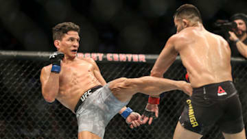 MINNEAPOLIS, MN - JUNE 29: Joseph Benavidez lands a high kick on Jussier Formiga. Benavidez would go on to win by TKO. (Photo by Alex Kormann/Star Tribune via Getty Images)