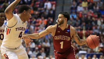 SAN DIEGO, CA - MARCH 16: Grant Riller #1 of the Charleston Cougars looks to pass against Chuma Okeke #4 of the Auburn Tigers in the first half in the first round of the 2018 NCAA Men's Basketball Tournament at Viejas Arena on March 16, 2018 in San Diego, California. (Photo by Sean M. Haffey/Getty Images)