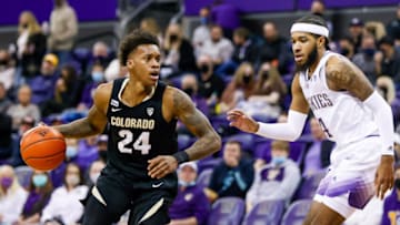 Jan 27, 2022; Seattle, Washington, USA; Colorado Buffaloes guard Elijah Parquet (24) dribbles against Washington Huskies guard PJ Fuller (4) during the first half at Alaska Airlines Arena at Hec Edmundson Pavilion. Mandatory Credit: Joe Nicholson-USA TODAY Sports