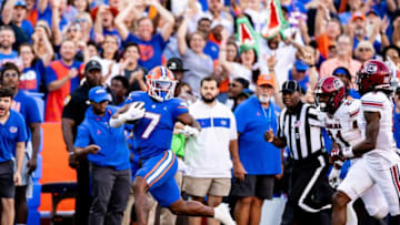 Florida Gators running back Trevor Etienne (7) rushes the sideline for a 80+ yard touchdown during the first half against the South Carolina Gamecocks at Steve Spurrier Field at Ben Hill Griffin Stadium in Gainesville, FL on Saturday, November 12, 2022. [Matt Pendleton/Gainesville Sun]Ncaa Football Florida Gators Vs South Carolina GamecocksSyndication Gainesville Sun