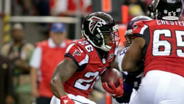 Nov 29, 2015; Atlanta, GA, USA; Atlanta Falcons running back Tevin Coleman (26) runs in the first quarter of their game against the Minnesota Vikings at the Georgia Dome. The Vikings won 20-10. Mandatory Credit: Jason Getz-USA TODAY Sports