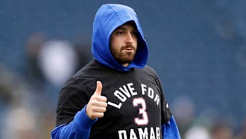 SEATTLE, WASHINGTON - JANUARY 08: Baker Mayfield #17 of the Los Angeles Rams wears a shirt honoring Damar Hamlin #3 of the Buffalo Bills prior to the game against the Seattle Seahawks at Lumen Field on January 08, 2023 in Seattle, Washington. (Photo by Steph Chambers/Getty Images)
