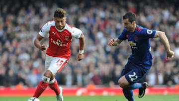 LONDON, ENGLAND - MAY 07: Alex Oxlade-Chamberlain of Arsenal takes on Hanrikh Mkhitarayan of Man Utd during the Premier League match between Arsenal and Manchester United at Emirates Stadium on May 7, 2017 in London, England. (Photo by David Price/Arsenal FC via Getty Images)