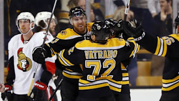 Dec 29, 2015; Boston, MA, USA; Boston Bruins right wing Jimmy Hayes (11) celebrates with center Frank Vatrano (72) after scoring his third goal of the game during the third period against the Ottawa Senators at TD Garden. The Bruins won 7-3. Mandatory Credit: Winslow Townson-USA TODAY Sports