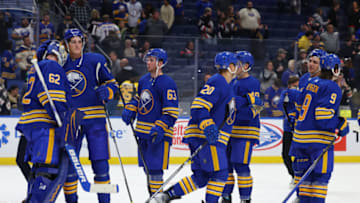 Sep 26, 2023; Buffalo, New York, USA; The Buffalo Sabres celebrate a win over the Boston Bruins at KeyBank Center. Mandatory Credit: Timothy T. Ludwig-USA TODAY Sports