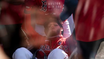 BOSTON, MA - MAY 15: Alex Verdugo #99 of the Boston Red Sox is pushed in a laundry cart after hitting a solo home run during the first inning of a game against the Los Angeles Angels of Anaheim on May 15, 2021 at Fenway Park in Boston, Massachusetts. (Photo by Billie Weiss/Boston Red Sox/Getty Images)