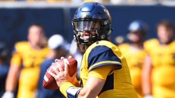 MORGANTOWN, WV - SEPTEMBER 09: Will Grier #7 of the West Virginia Mountaineers looks to pass during the second quarter against the East Carolina Pirates at Mountaineer Field on September 9, 2017 in Morgantown, West Virginia. (Photo by Joe Sargent/Getty Images)