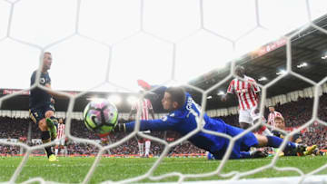 STOKE ON TRENT, ENGLAND - SEPTEMBER 10: Harry Kane of Tottenham Hotspur scores past Shay Given of Stoke City during the Premier League match between Stoke City and Tottenham Hotspur at Britannia Stadium on September 10, 2016 in Stoke on Trent, England. (Photo by Laurence Griffiths/Getty Images)