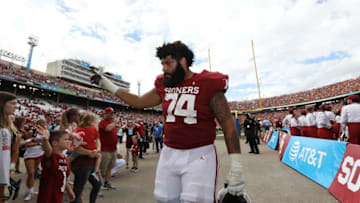 DALLAS, TX - OCTOBER 06: Cody Ford #74 of the Oklahoma Sooners walks off the field after a loss against the Texas Longhorns in the 2018 AT&T Red River Showdown at Cotton Bowl on October 6, 2018 in Dallas, Texas. (Photo by Ronald Martinez/Getty Images)