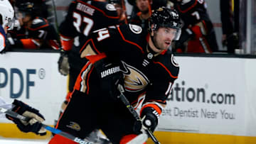 ANAHEIM, CA - FEBRUARY 9: Adam Henrique #14 of the Anaheim Ducks skates with the puck during the game against the Edmonton Oilers. (Photo by Debora Robinson/NHLI via Getty Images)