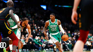 BOSTON, MASSACHUSETTS - DECEMBER 22: Joe Johnson #55 of the Boston Celtics brings the ball up court during the fourth quarter of the game against the Cleveland Cavaliers at TD Garden on December 22, 2021 in Boston, Massachusetts. NOTE TO USER: User expressly acknowledges and agrees that, by downloading and or using this photograph, User is consenting to the terms and conditions of the Getty Images License Agreement. (Photo by Omar Rawlings/Getty Images)