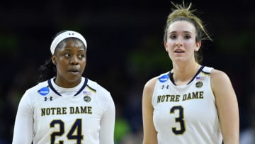 SOUTH BEND, IN - MARCH 16: Notre Dame Fighting Irish guard Arike Ogunbowale (24) and Notre Dame Fighting Irish guard Marina Mabrey (3) look on against the Cal State Northridge Matadors during the first round of the Division I Women's Championship on March 16, 2018 at the Purcell Pavilion in South Bend, Indiana. (Photo by Quinn Harris/Icon Sportswire via Getty Images)