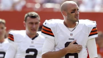 Sep 14, 2014; Cleveland, OH, USA; Cleveland Browns quarterback Brian Hoyer (6) and quarterback Johnny Manziel (2) stretch before a game against the New Orleans Saints at FirstEnergy Stadium. Mandatory Credit: Ron Schwane-USA TODAY Sports