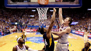 LAWRENCE, KS - FEBRUARY 13: Mitch Lightfoot