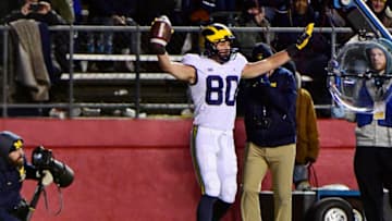 PISCATAWAY, NJ - NOVEMBER 10: Oliver Martin #80 of the Michigan Wolverines scores a touchdown against the Rutgers Scarlet Knights during the third quarter at HighPoint.com Stadium on November 10, 2018 in Piscataway, New Jersey. Michigan won 42-7. (Photo by Corey Perrine/Getty Images)