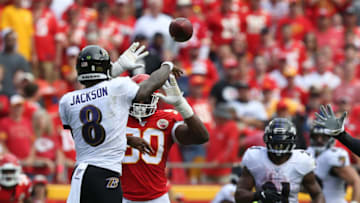 Baltimore Ravens quarterback Lamar Jackson (8) completes a pass to running back Mark Ingram (21) (Photo by Scott Winters/Icon Sportswire via Getty Images)